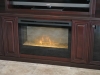Solid oak entertainment centers with built in fire place
