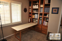 Custom sewing center in home office- open