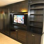 Black wallbed/entertainment center combo by Lift & Stor Beds in Arizona